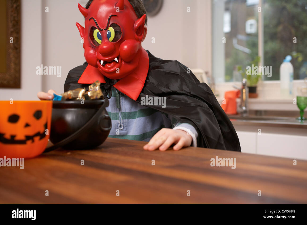 Boy wearing Halloween costume Stock Photo