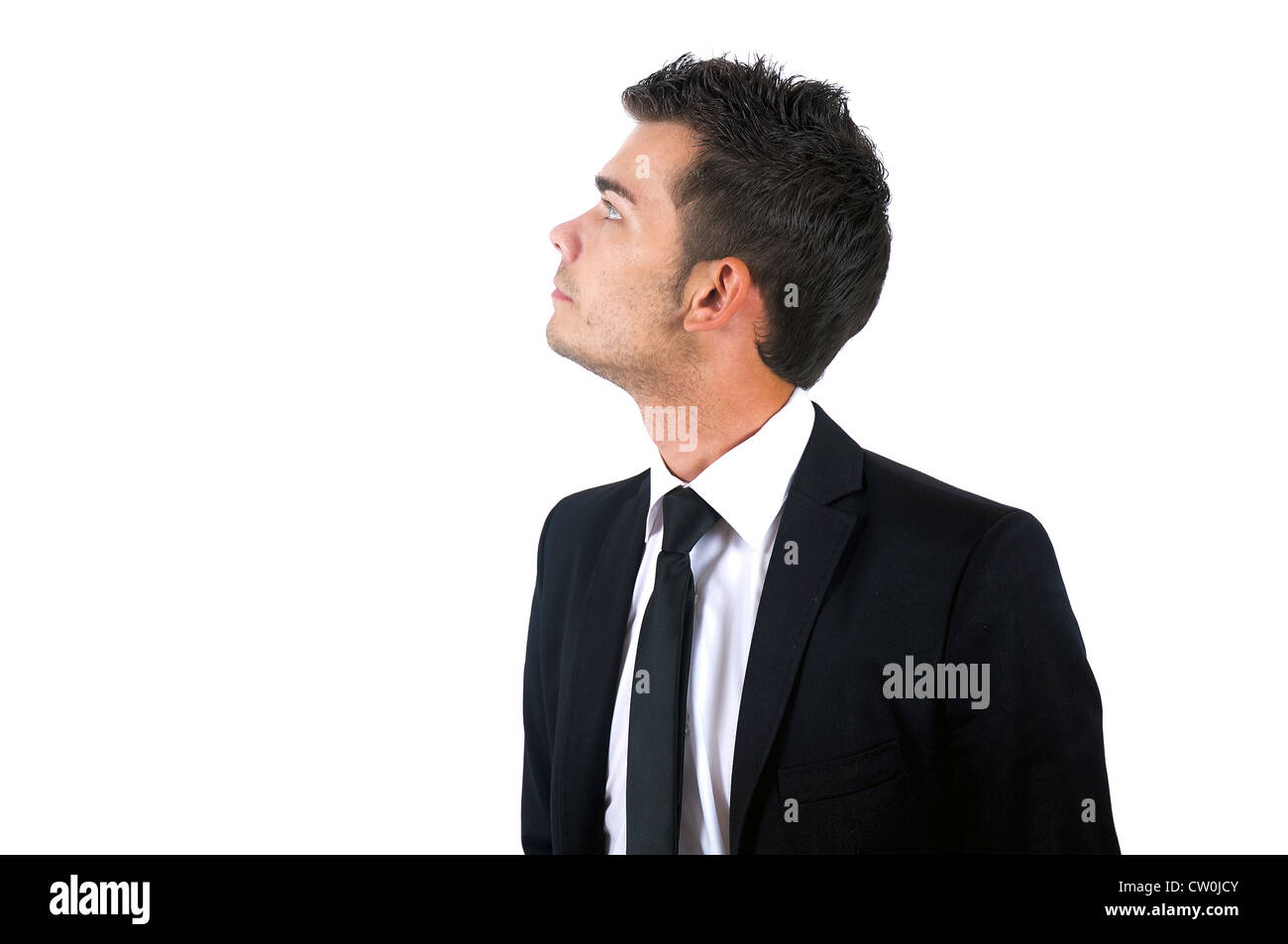 Isolated young business man standing Stock Photo
