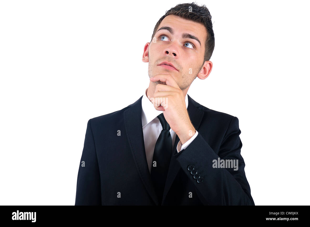 Isolated young business man thinking Stock Photo