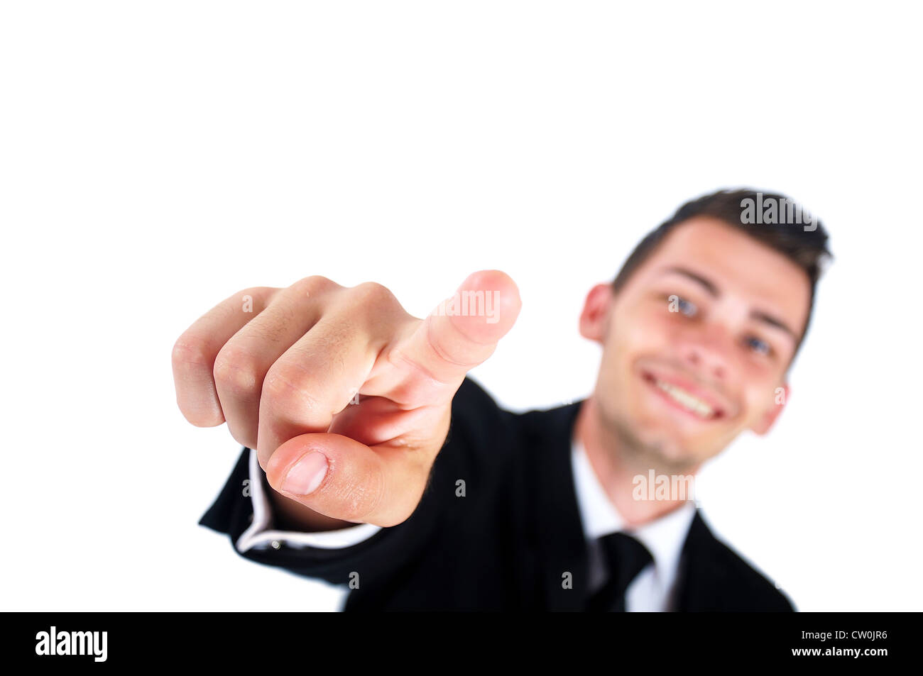Isolated young business man pointing Stock Photo