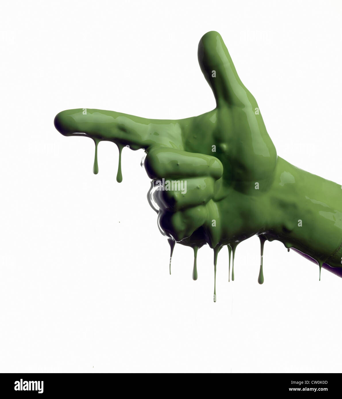 Green painted hand pointing Stock Photo