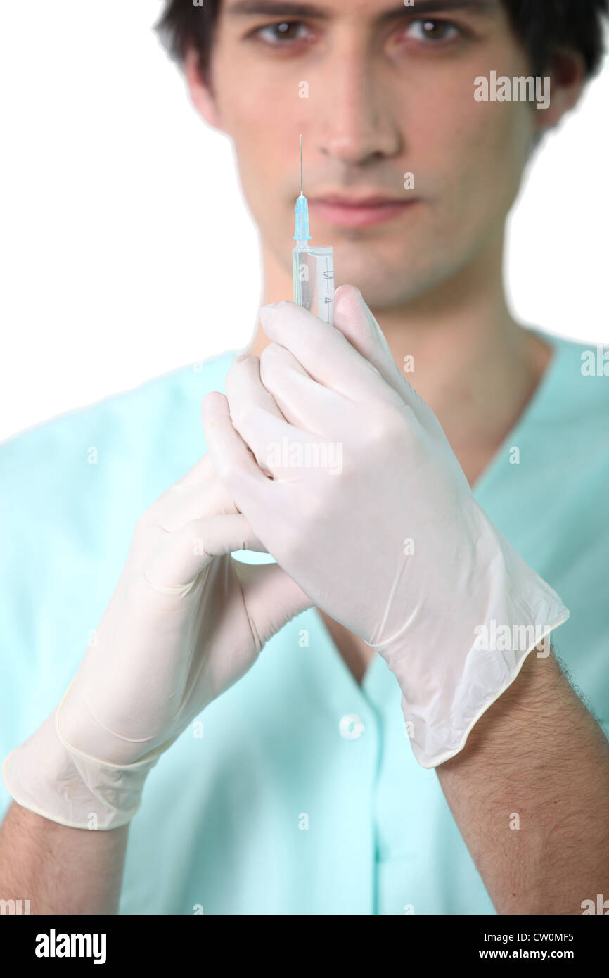 Nurse holding injection Stock Photo - Alamy
