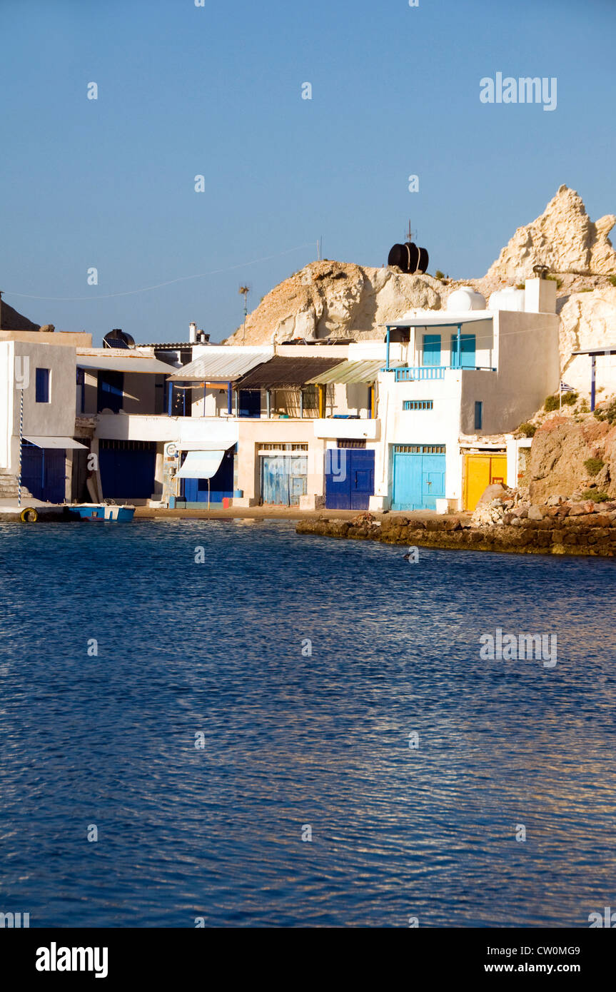 fisherman houses boat storage garages built into rock cliffs on