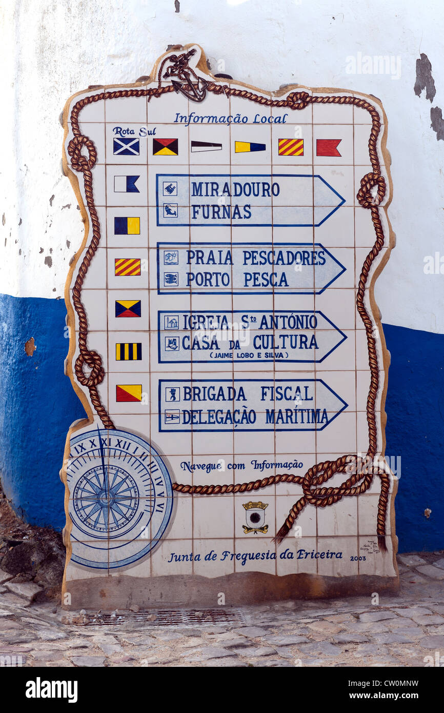 An elaborate direction sign in Ericeira, Lisbon Coast, Portugal. Stock Photo