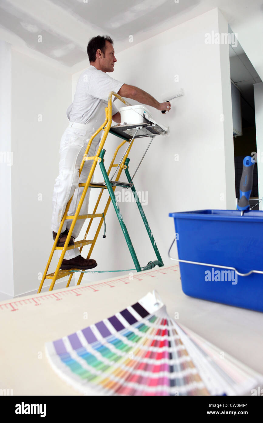 Decorator painting base coat Stock Photo Alamy