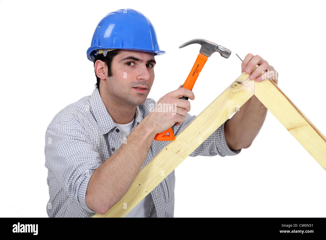 Carpenter making wooden frame Stock Photo Alamy