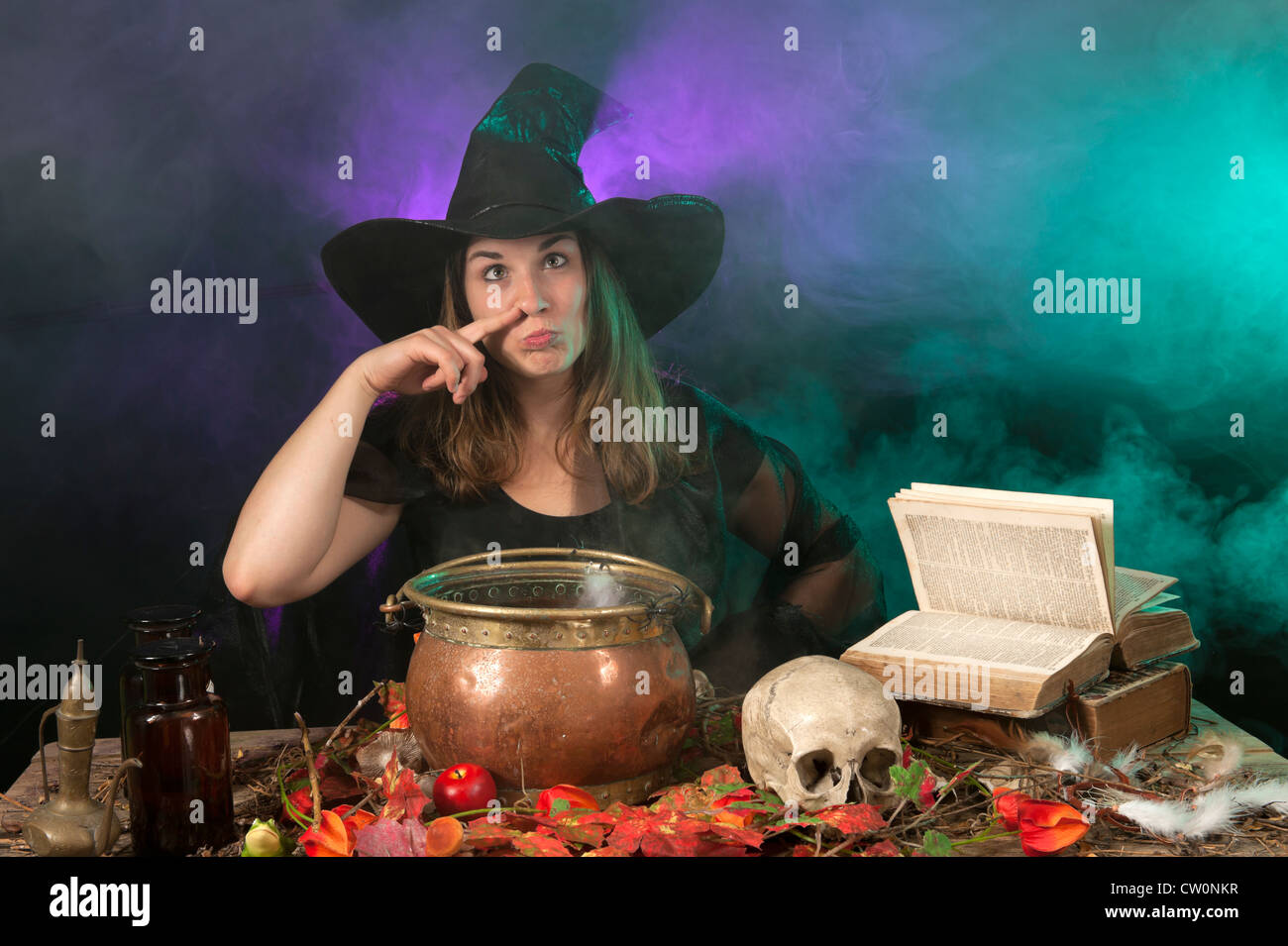 halloween witch making potions Stock Photo