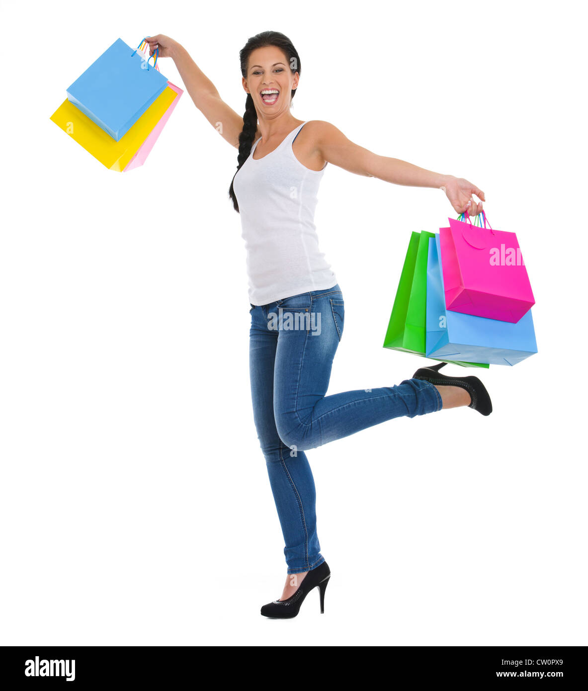 Full length portrait of cheerful girl with shopping bags Stock Photo ...