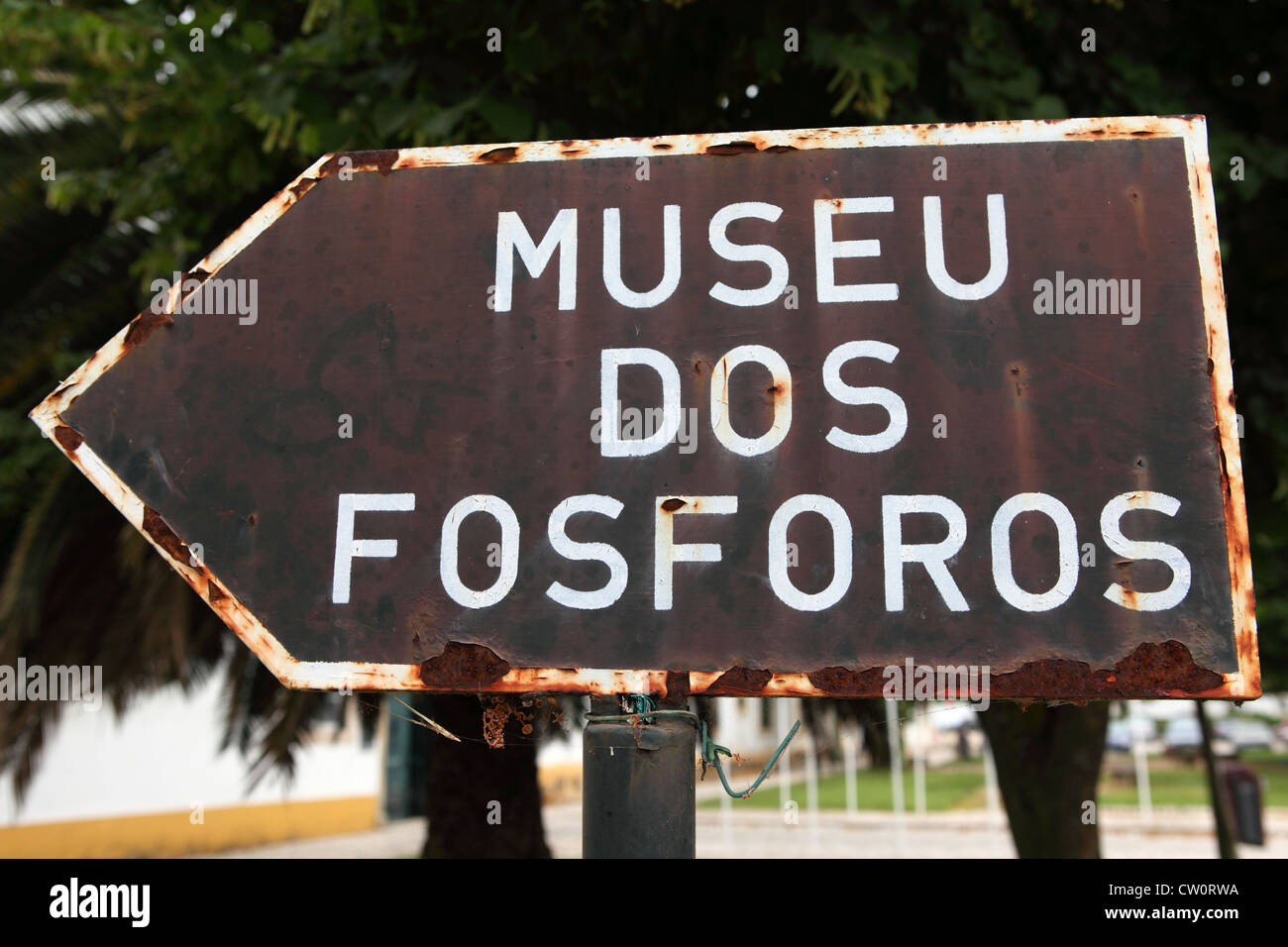 Rusted, weatherbeaten sign for the Matchbox Museum ('Museu dos Fosforos') in Tomar, Portugal. Stock Photo