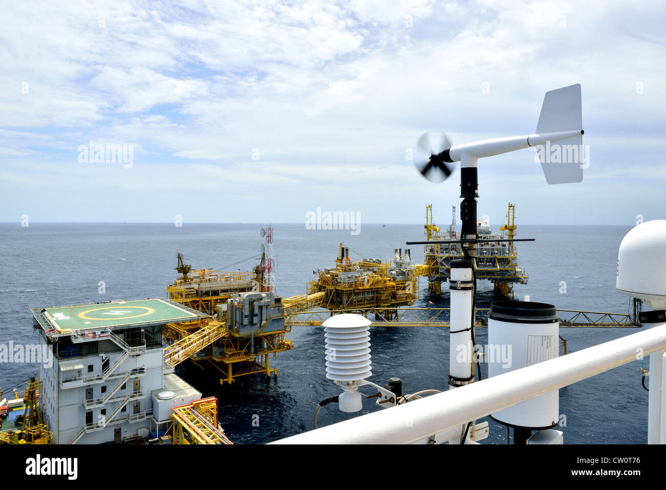 The wind velocity and direction indicator is set on the oil rig helideck . Stock Photo