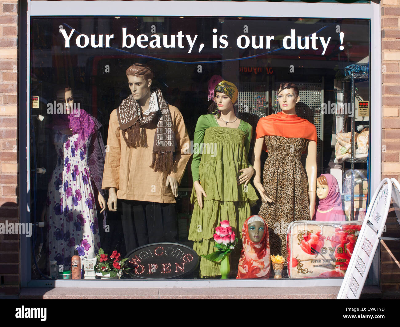 Shop window and slogan in downtown Oslo Norway, your beauty is our duty ...