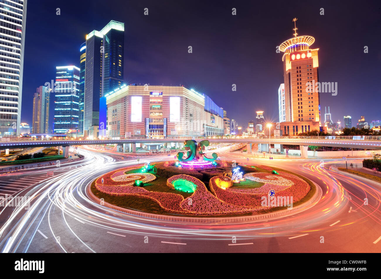 Shanghai street view at night with skyscrapers Stock Photo