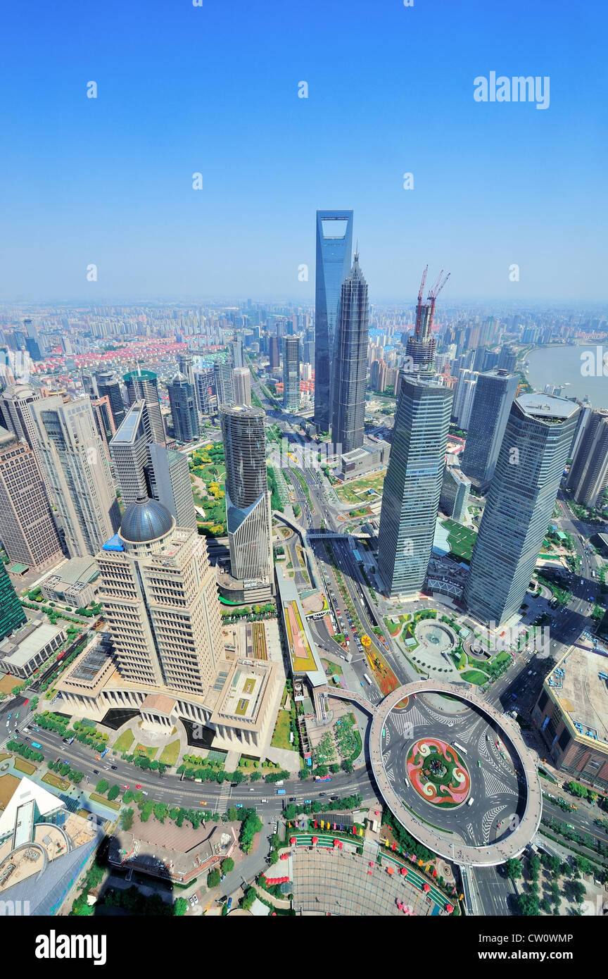 Shanghai city aerial view with urban architecture and blue sky in the ...