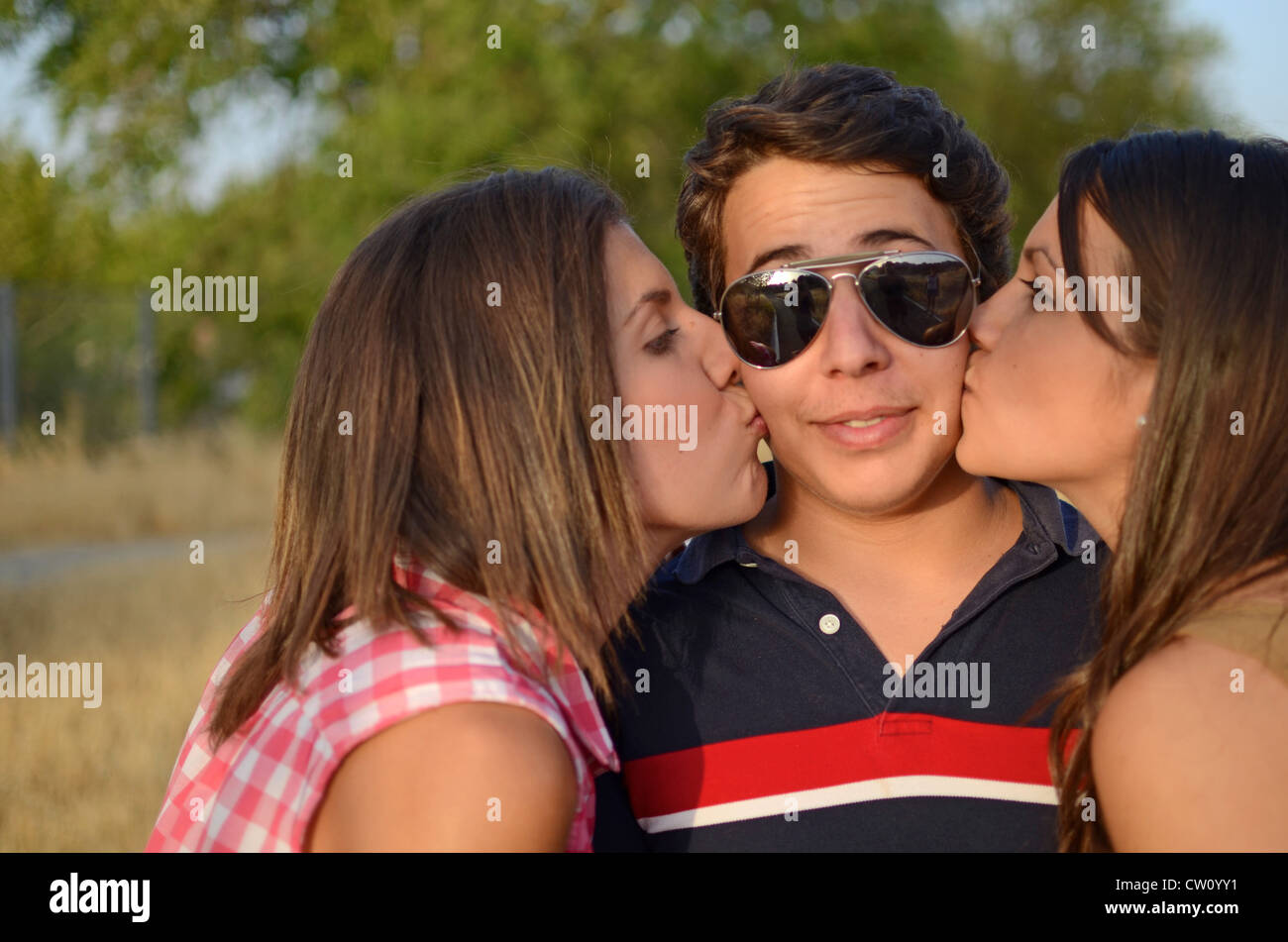 Young women kissing