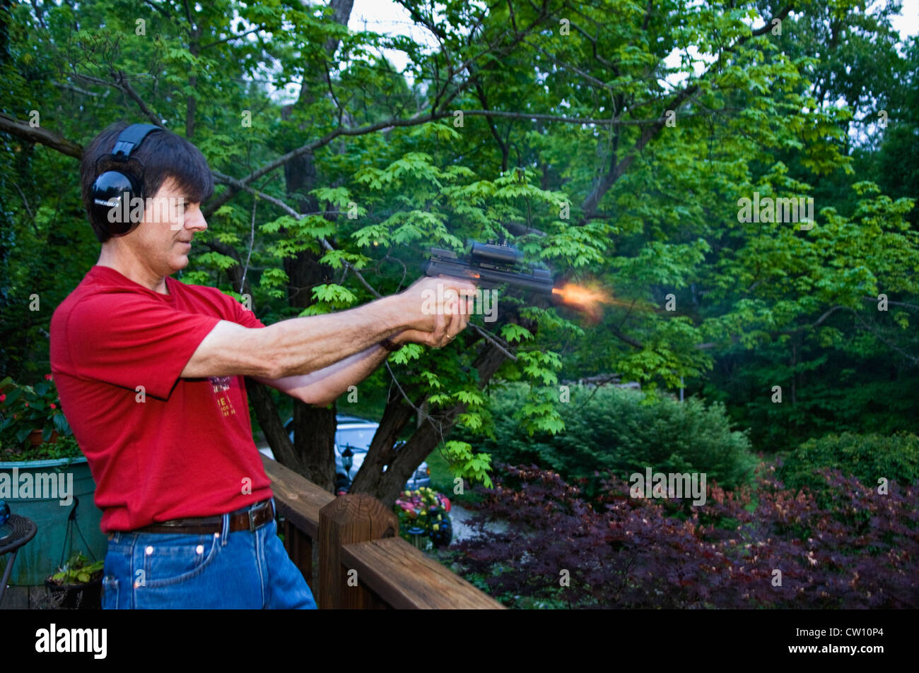 Man Shooting a .22 SSemi-automatic Pistol Stock Photo
