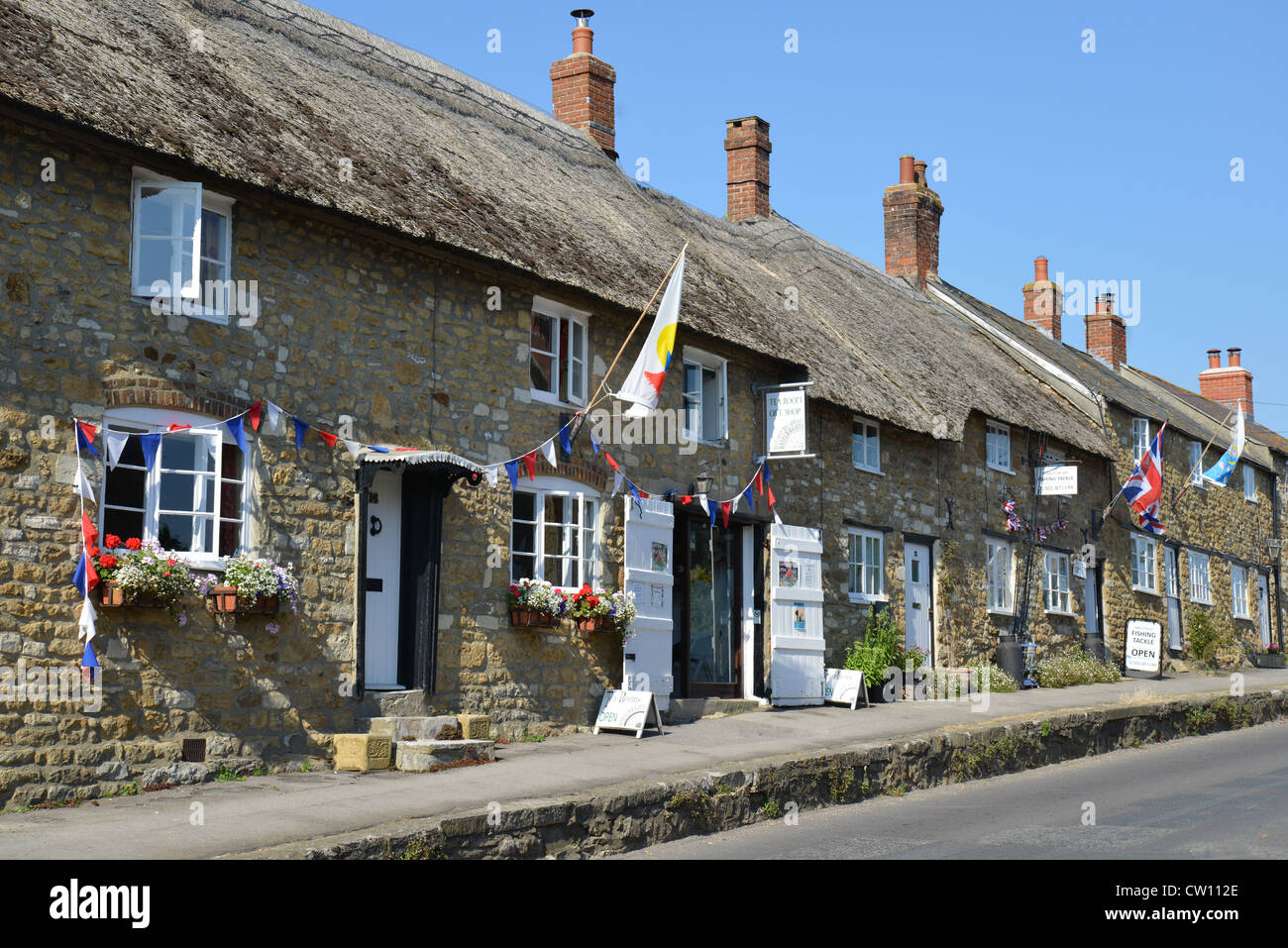 Row of cottages with gift shop and cafe, Rodden Row, Abbotsbury, Dorset