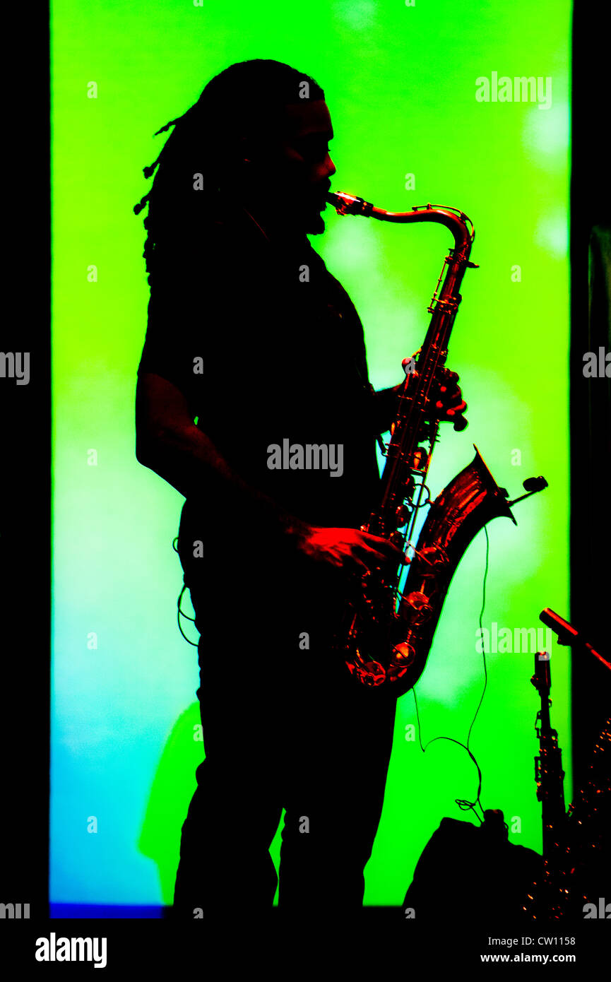 Saxophone player on stage with lights Stock Photo