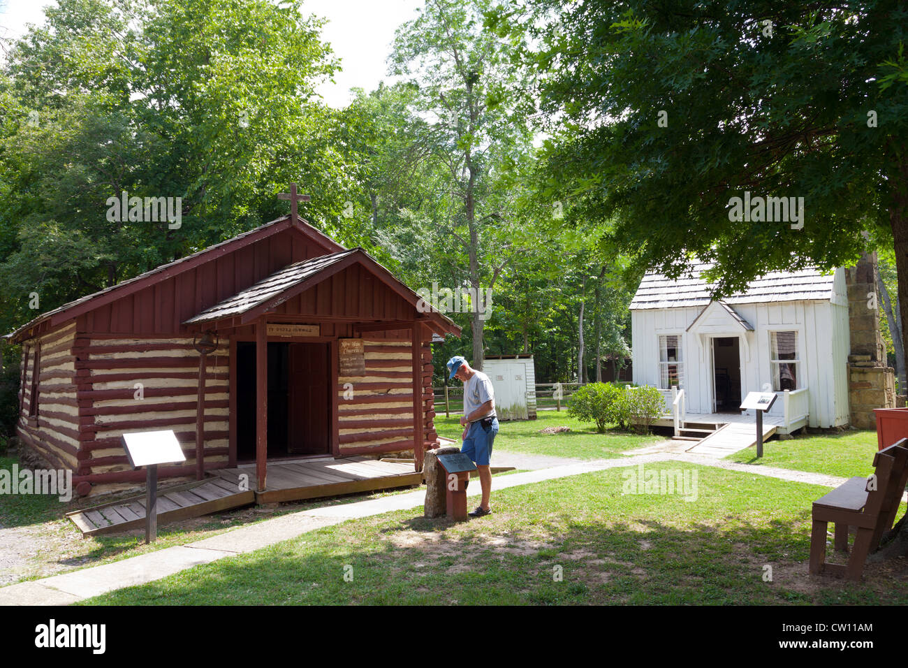 A visitor explores Adams Corner Rural Village at the Cherokee Heritage