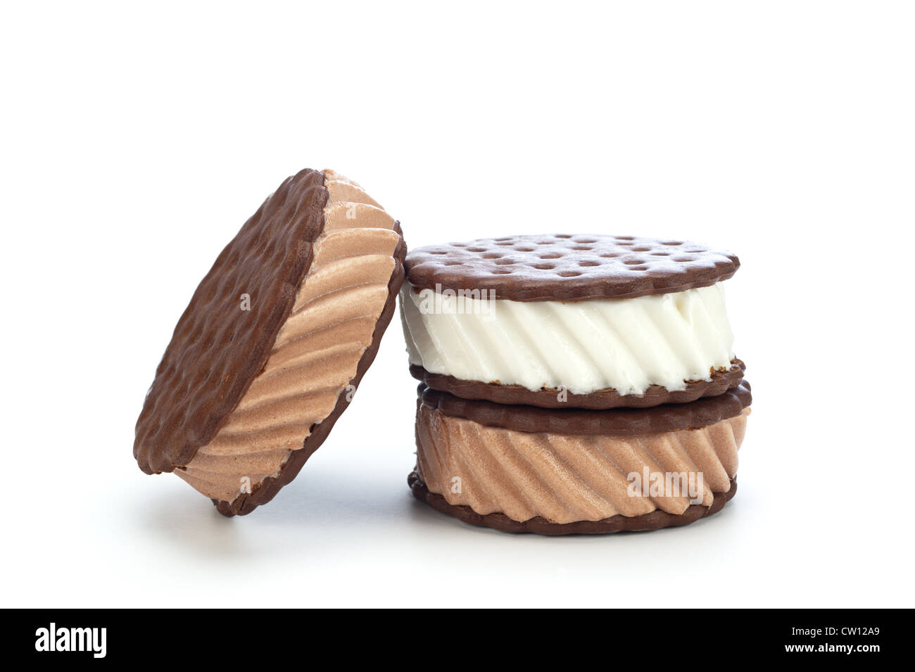 Chocolate and vanilla ice cream sandwiches on a white background. Stock Photo