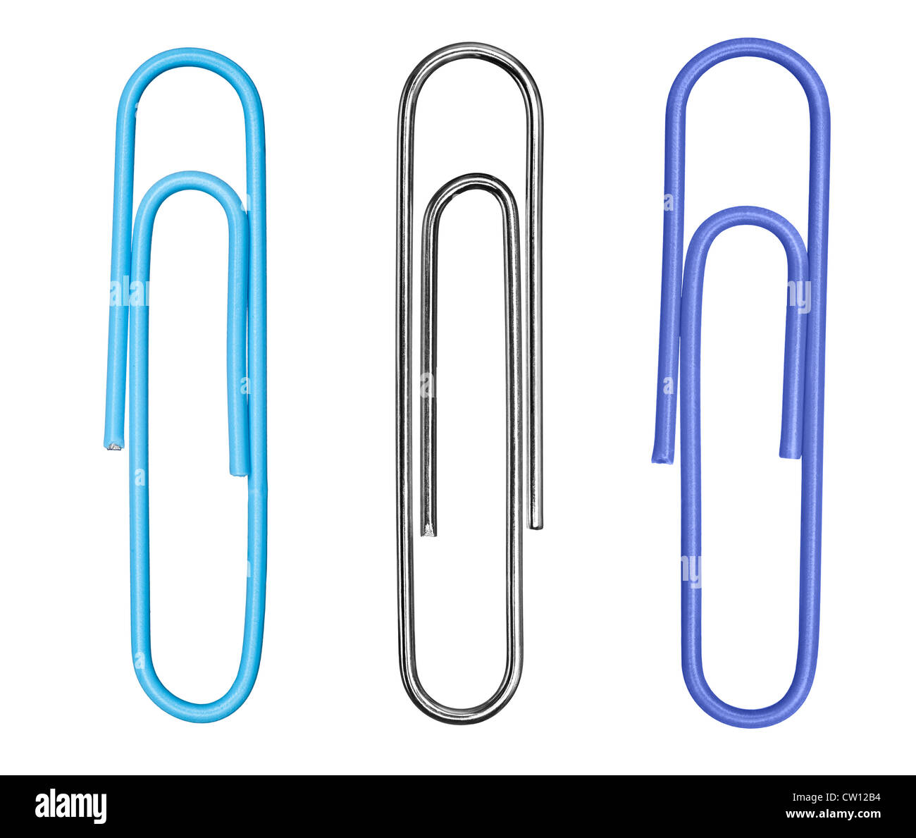 A collection of three paper clips, including a traditional silver clip, isolated on a white background. Stock Photo