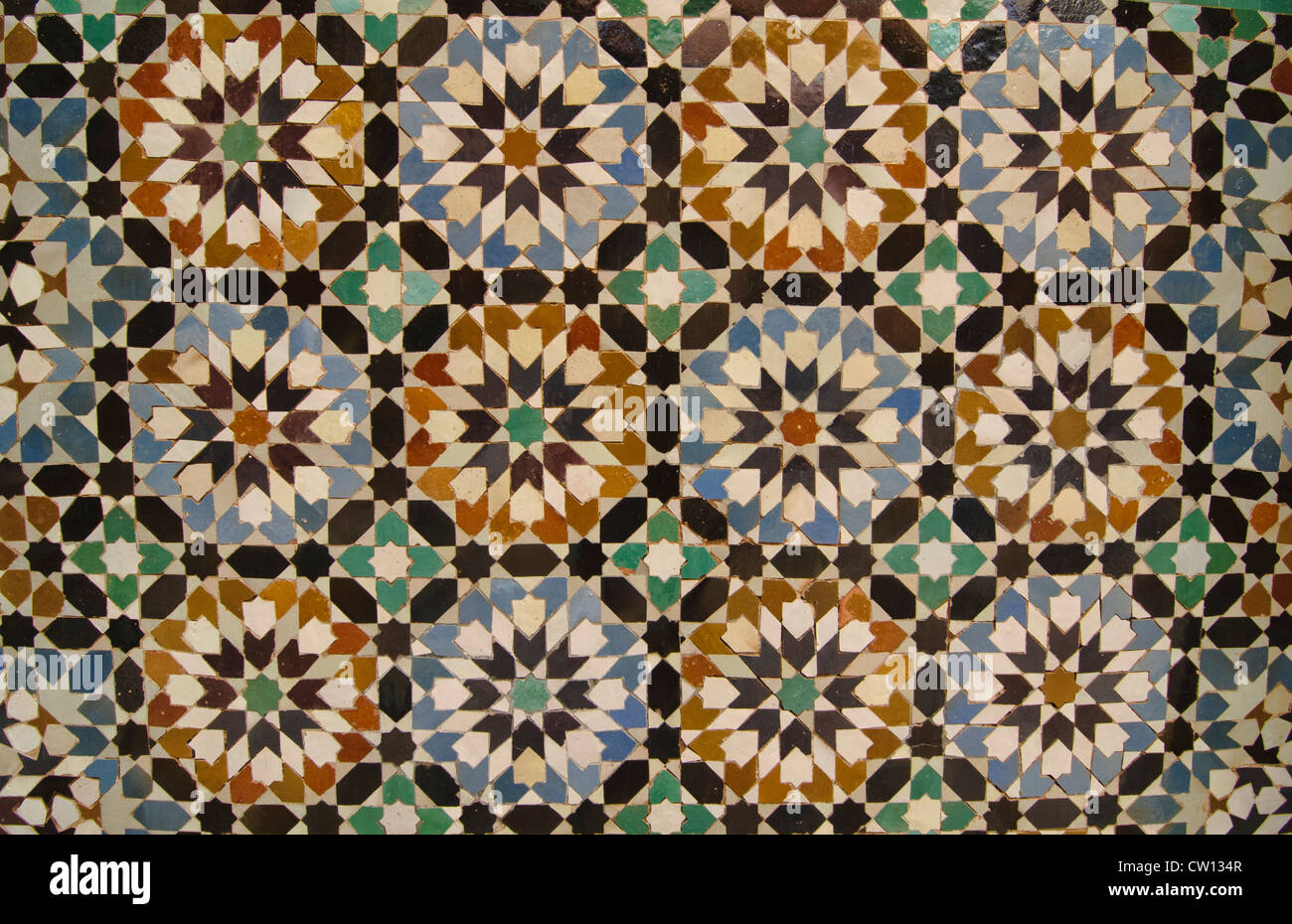 intricate tile design on the Ali ben Youssef Medersa in Marrakech, Morocco Stock Photo