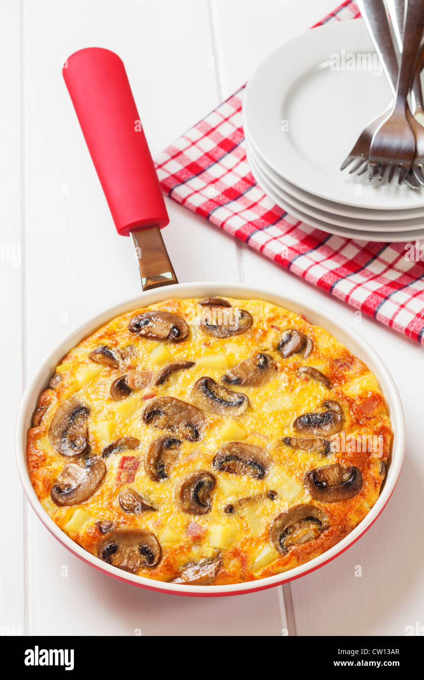Frittata with bacon, potato, mushroom and onion Stock Photo Alamy