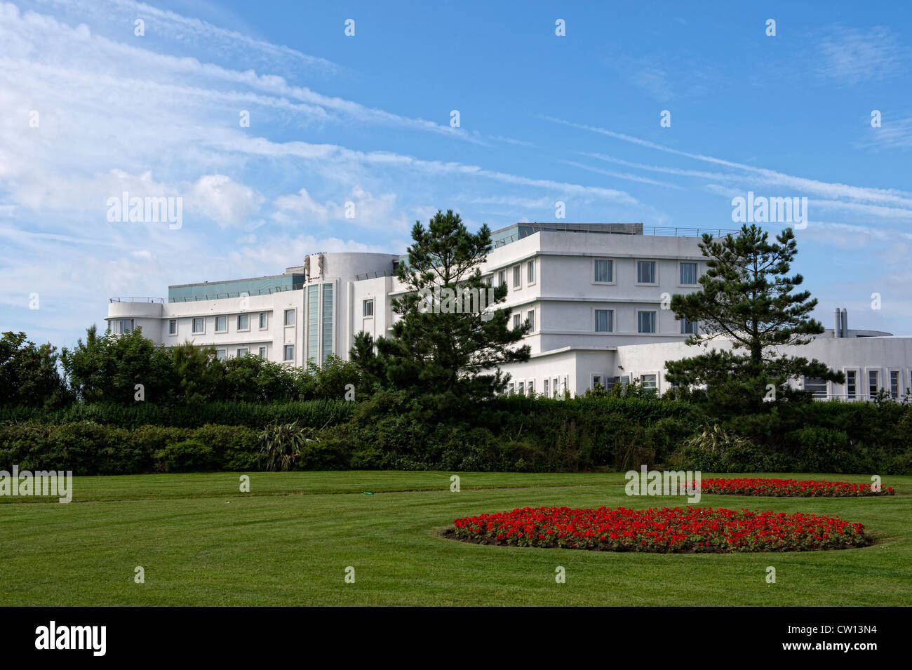 The Midland Hotel in Morecambe, Lancashire viewed from the promenade gardens. Stock Photo