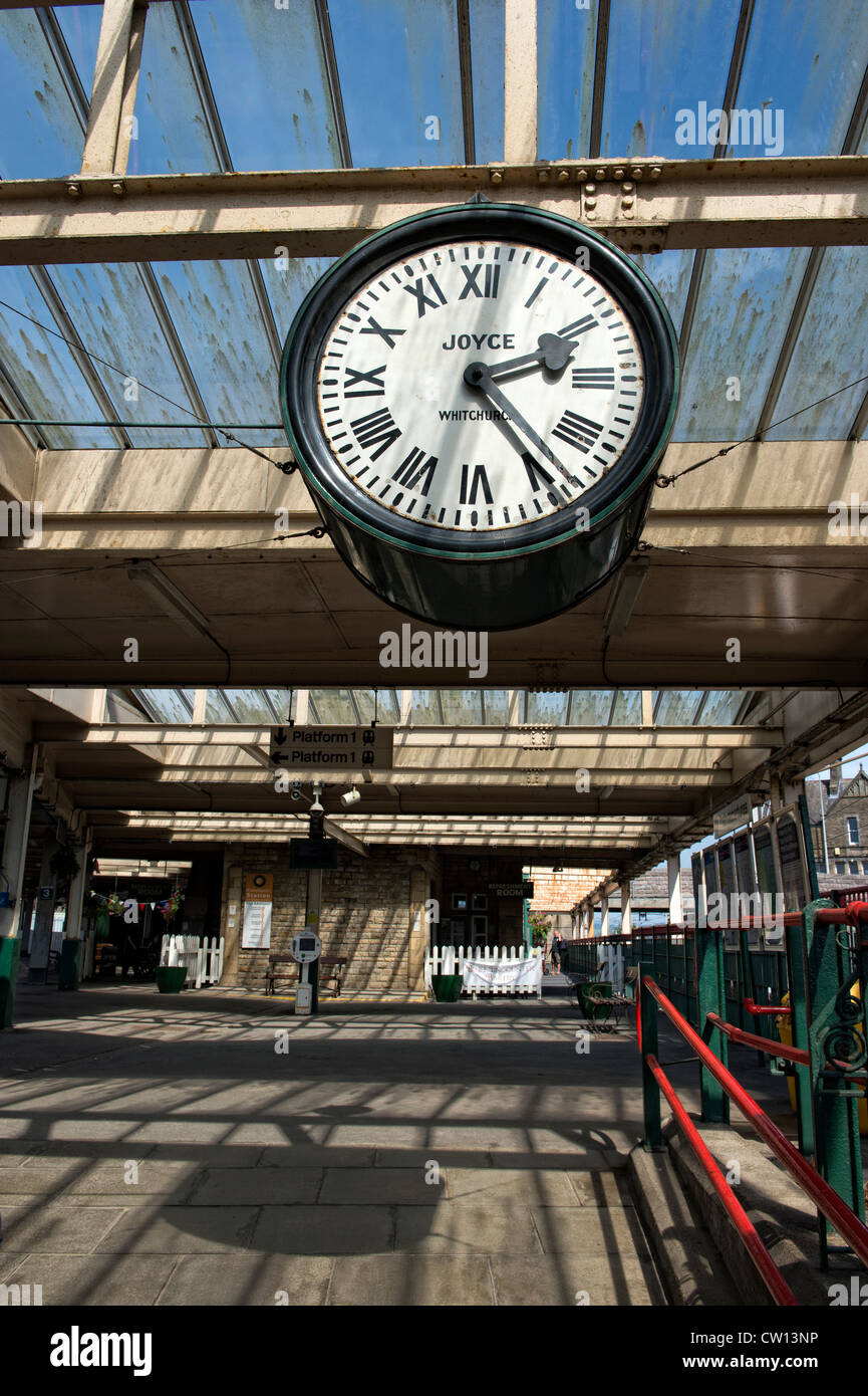 Clock on the platform at Carnforth Railway Station in Lancashire. Stock Photo