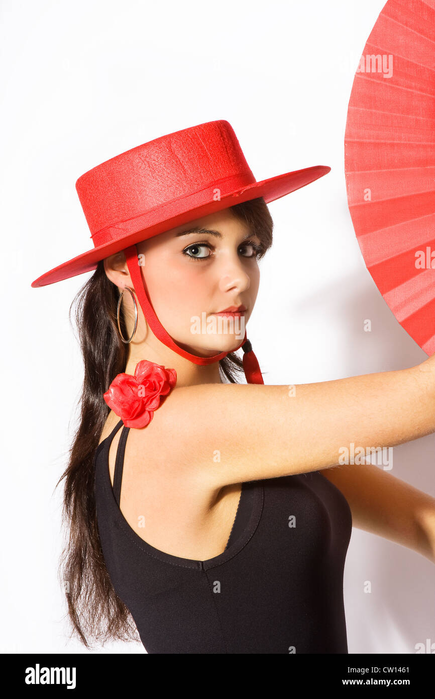 Young beautiful Spanish flamenco dancer in classical pose Stock Photo