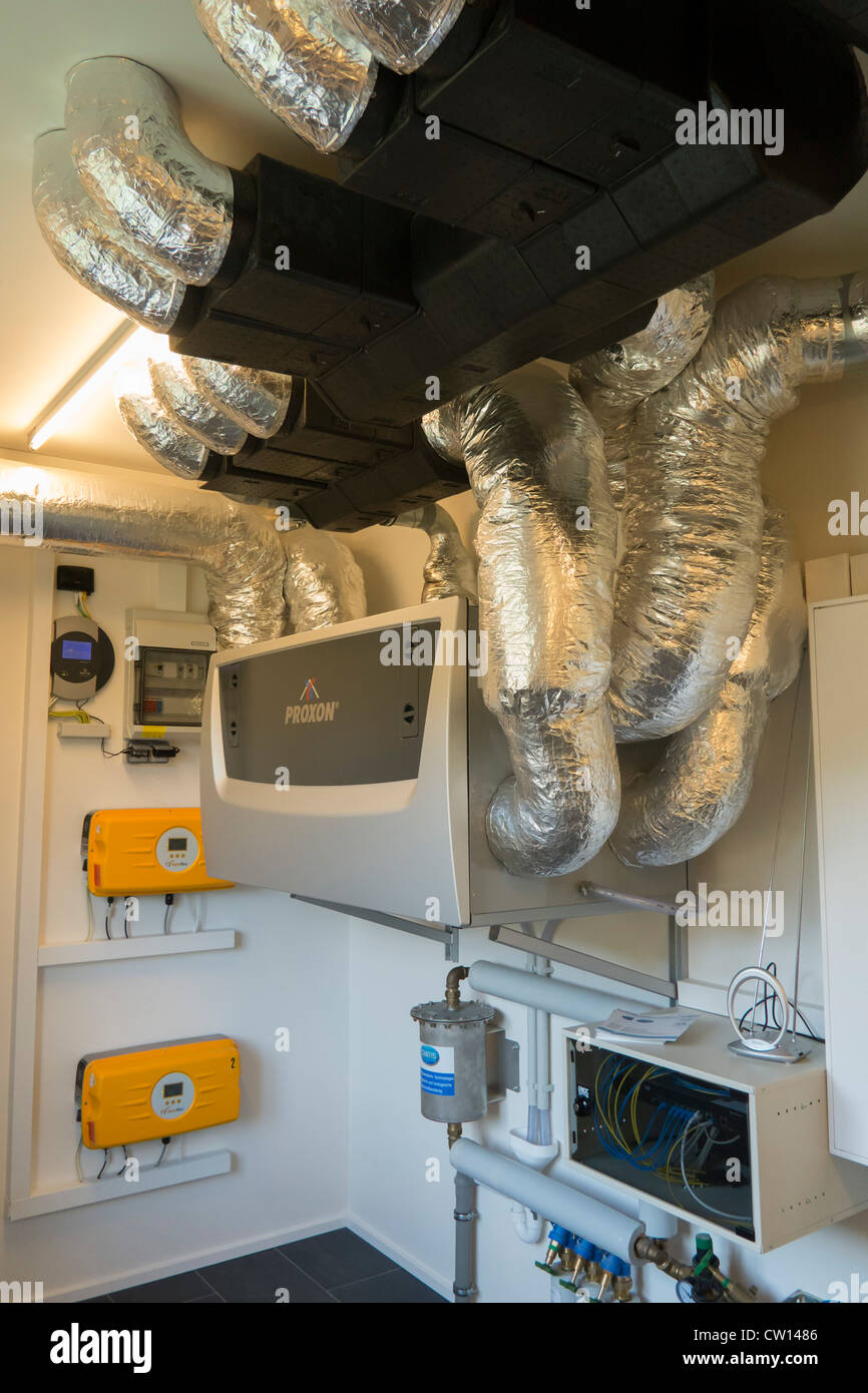 Boiler room with modern heating and ventilation equipment in new highly  energy efficient family house in Germany Stock Photo - Alamy