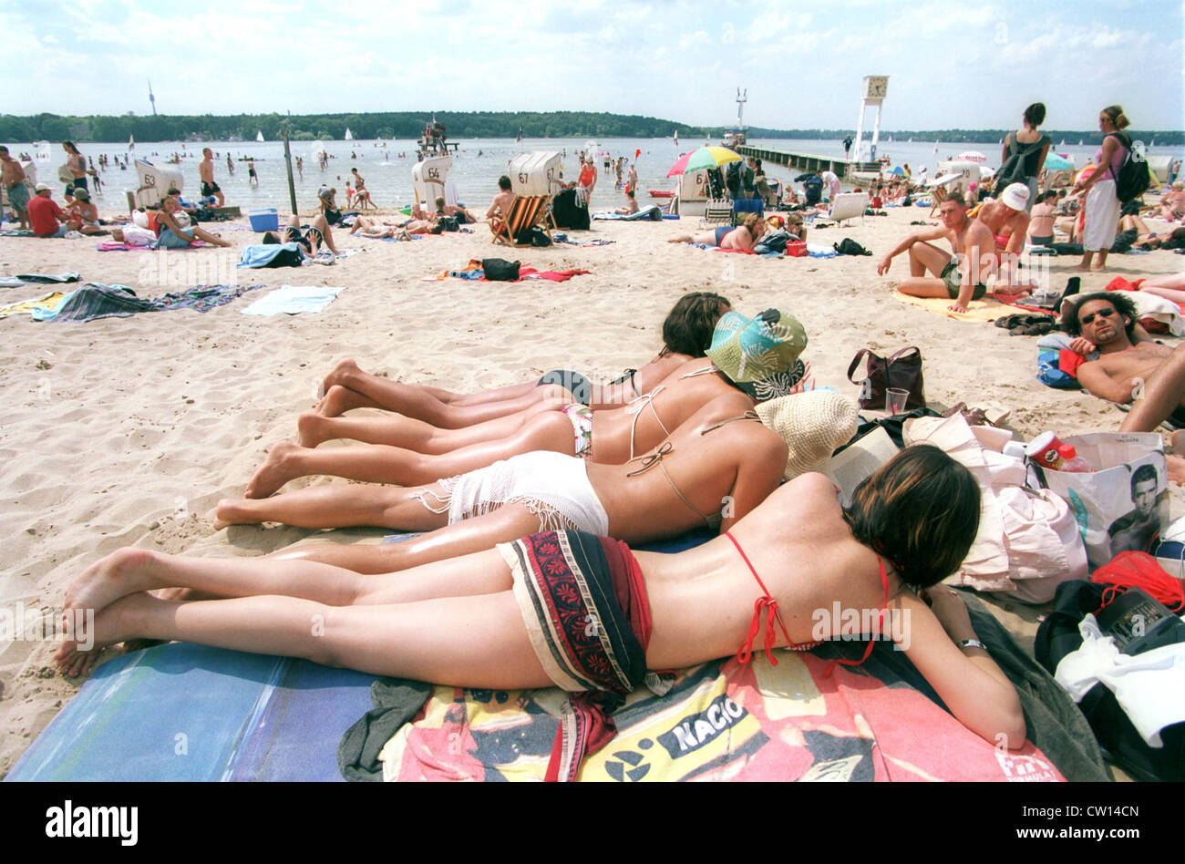 Women sunbathing in beach Wannsee in Berlin Stock Photo