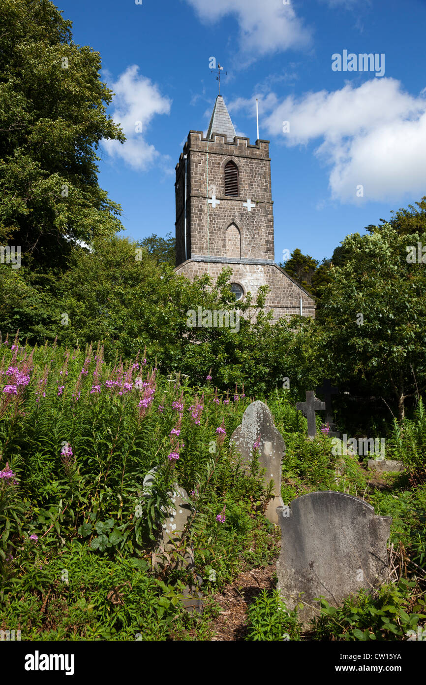Church and overgrown graveyard, Blaenavon, Wales, UK Stock Photo