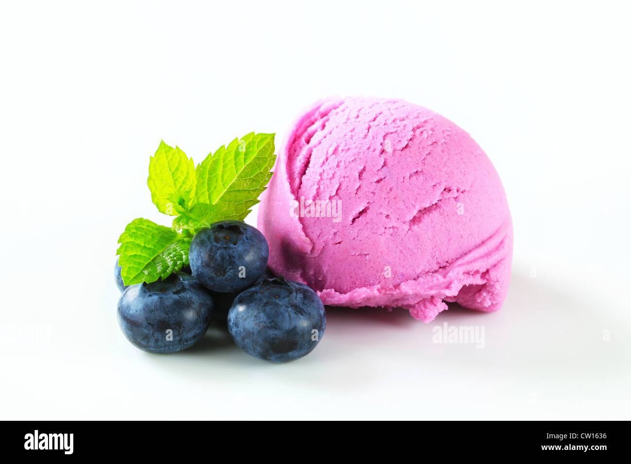 Scoop of fruit ice cream with fresh blueberries Stock Photo