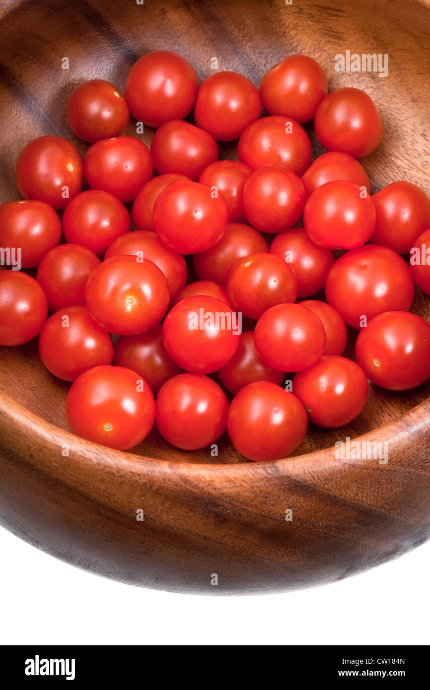 many red cherry tomatoes in wooden bowl Stock Photo - Alamy