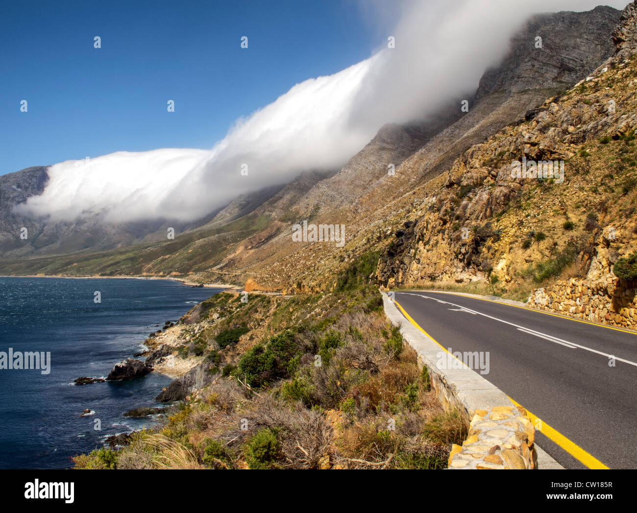 Scenic drive with wonderful sea and mountain views - Clarens Drive, Western Cape, South Africa Stock Photo