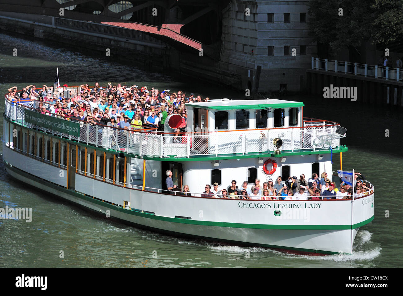 USA Illinois Chicago's Leading Lady cruises down the Chicago River with a full load of passengers. Stock Photo