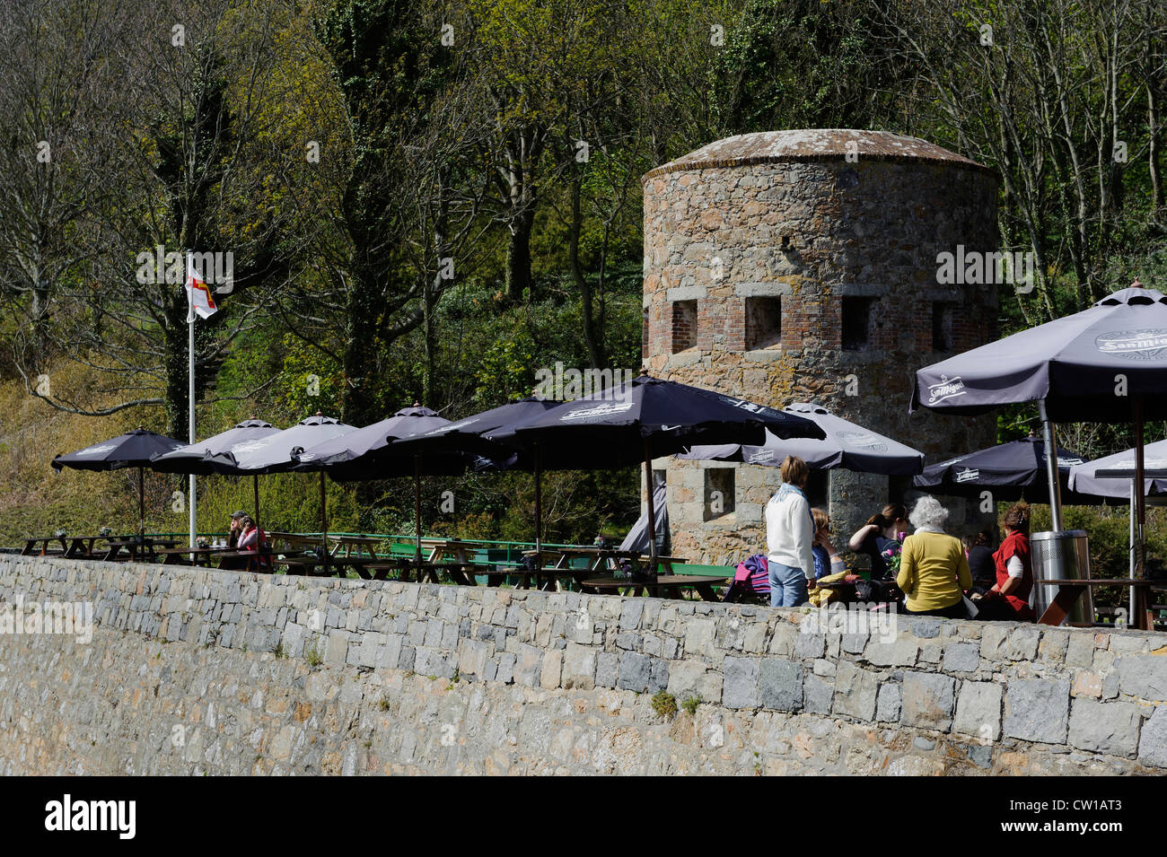 Restaurant and Watchtower,  Fermain Bay, Isle of Guernsey, Channel Islands Stock Photo