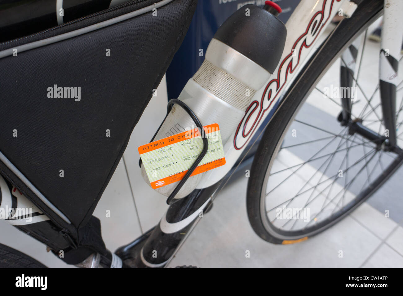 Bicycle with it's own train ticket Stock Photo