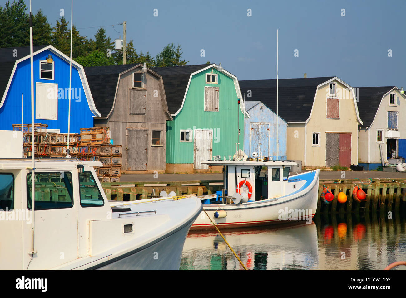 Lobster boats tied up at a wharf on the north shore of Prince Edward