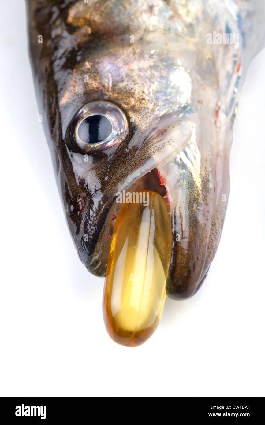 Close up of a   fish oil capsule, a nutrional supplement high in omega-3 fatty acids, EPA, DHA, and vitamins A and D. Stock Photo
