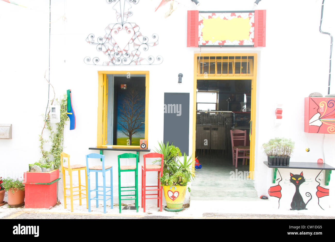 cafe coffee shop bar with colorful vintage Greece style chairs, stools