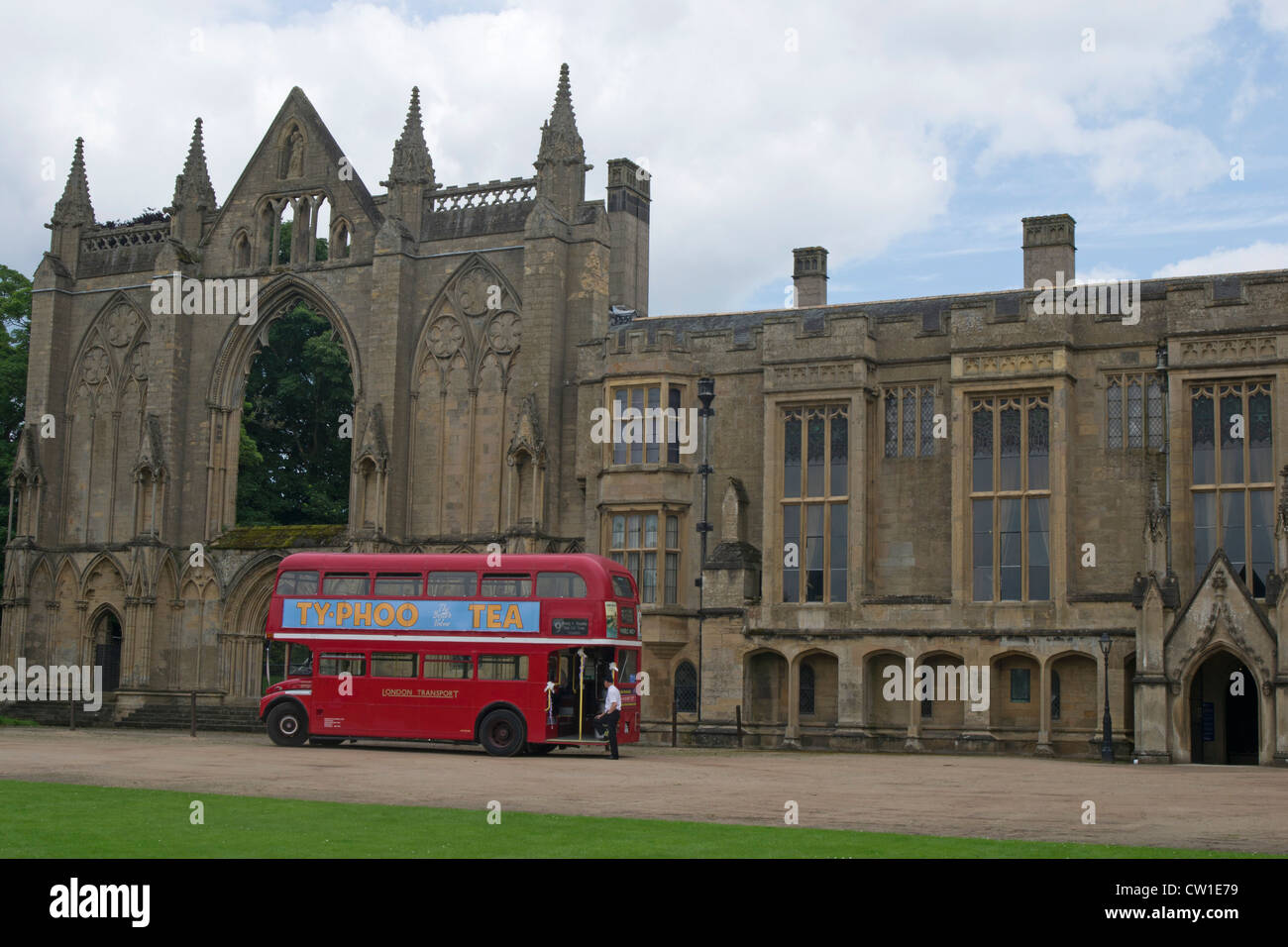 Red Double Decker Bus outside the entrance to Newstead Abbey, Nottingham, England, UK Stock Photo