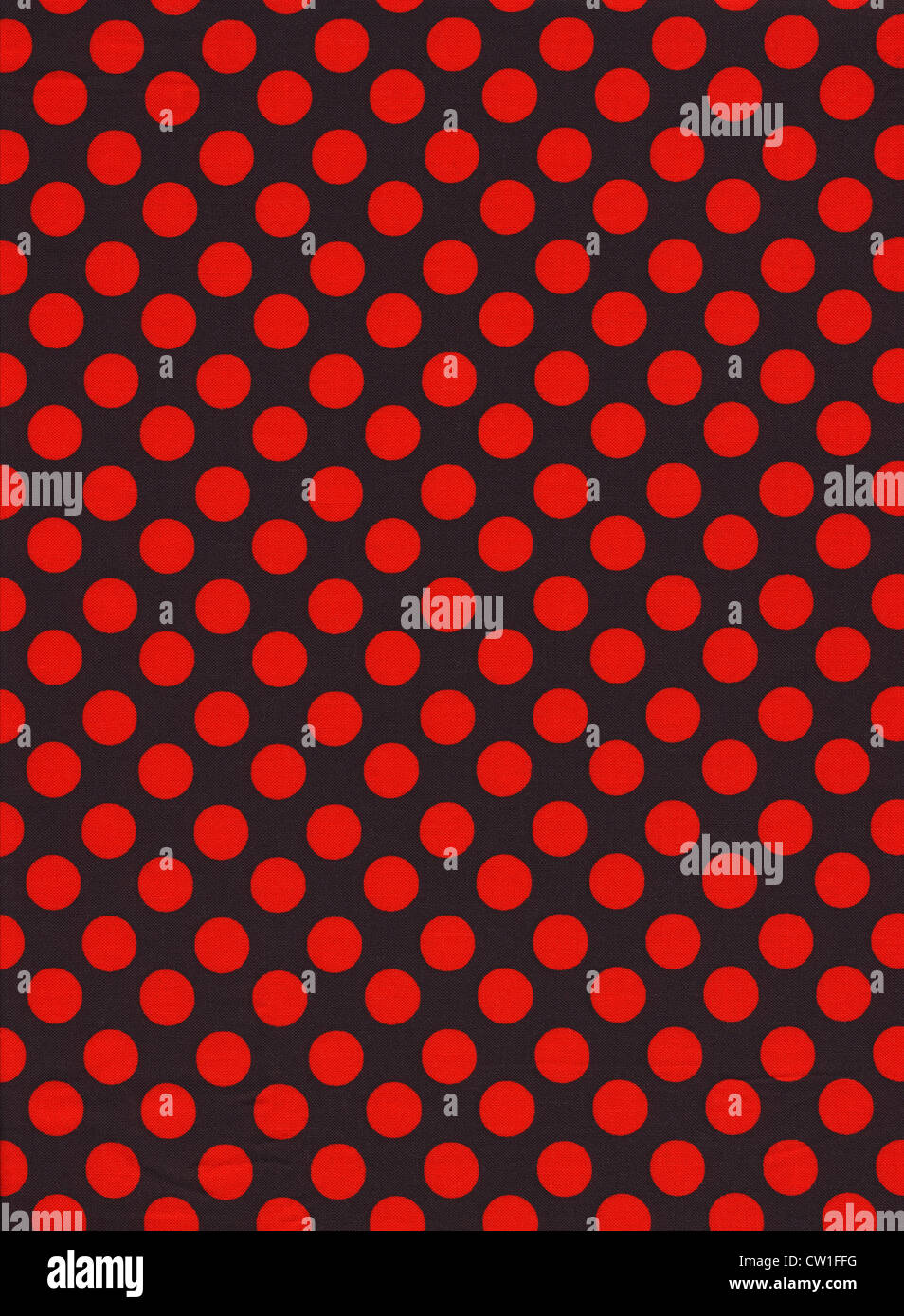 Black Fabric Background With Red Polka Dot Pattern Stock