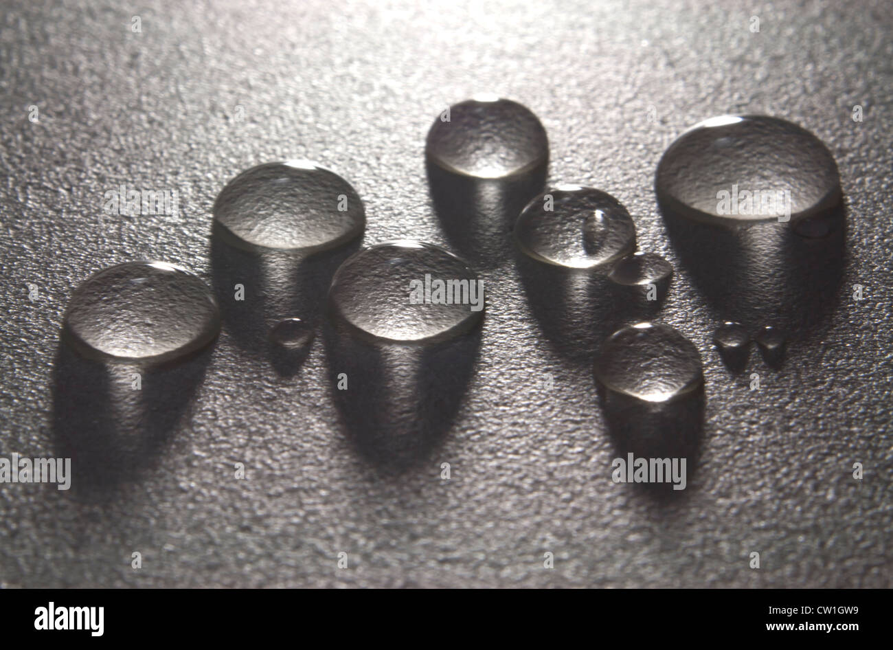 Close up macro of water drops on textured surface with copy space Stock ...