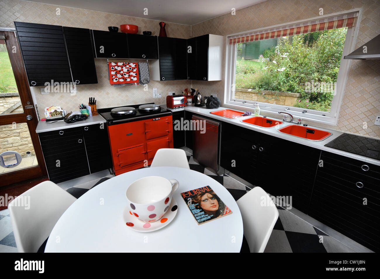 A kitchen diner in a 1970's style house which was featured in a 1975 magazine makeover UK Stock Photo
