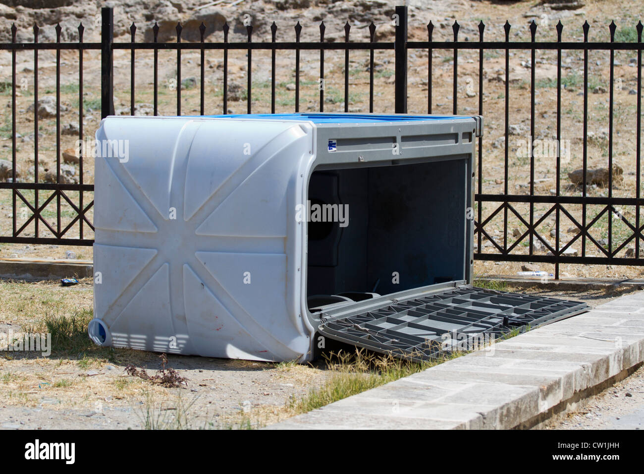 A port-a-loo on its side at the acropolis near lindos Greece, Mediterranean Stock Photo