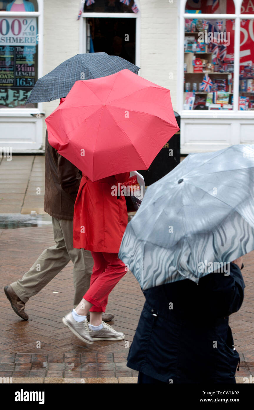 People Carrying Umbrellas Stock Photo - Alamy