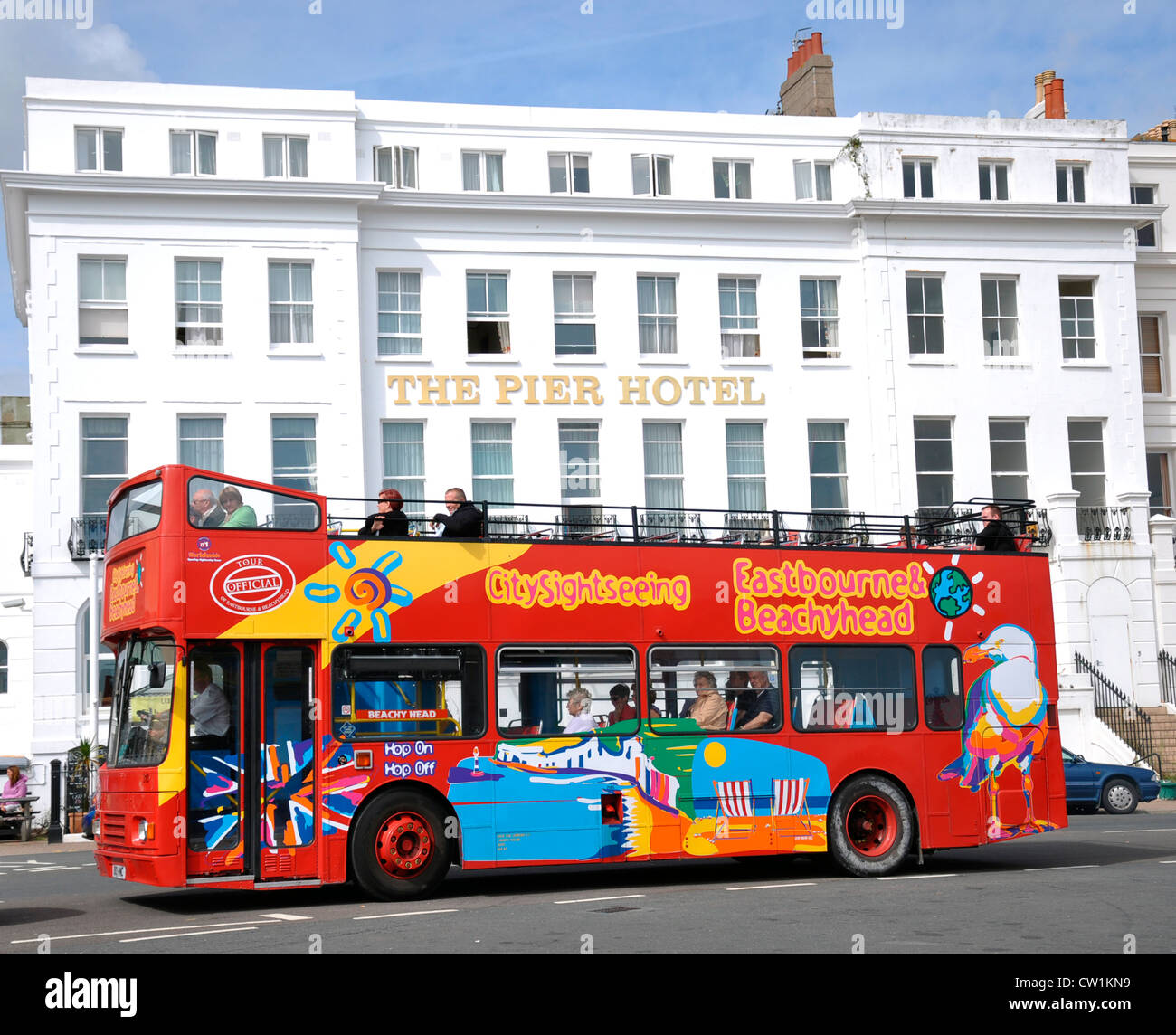 Eastbourne. Sightseeing bus in front of The Pier Hotel, in Eastbourne, East Sussex, England, UK. Stock Photo