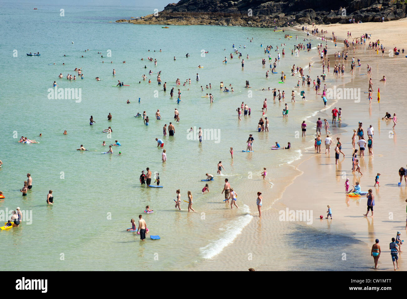 St. Ives Porthminster beach shore on a busy mid summer holidays day. Stock Photo
