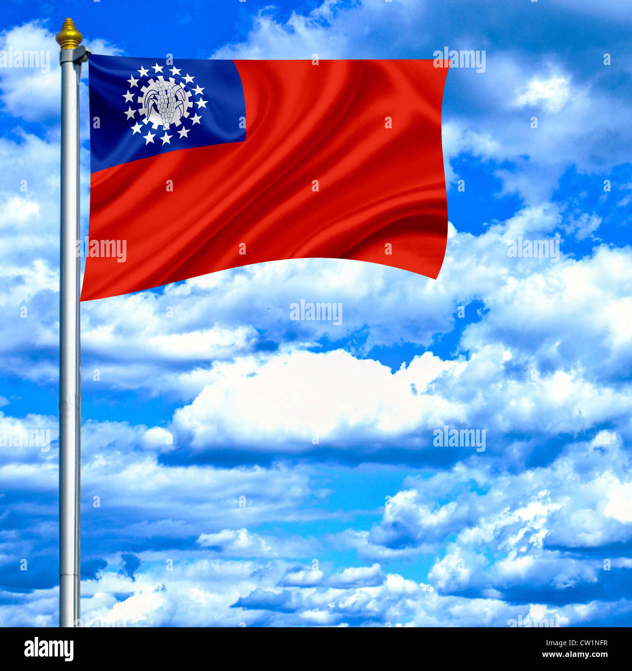Myanmar waving flag against blue sky Stock Photo - Alamy